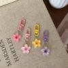 Wholesale Colorful Transparent Small Flower Keychain Women's Ins Style Cute Key Pendant Bag Hanging Accessories Headset Bag Decoration