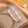 Wholesale PVD Coated 18K Real Gold Plated Star 304 Stainless Steel Simple Style Plating Hollow Out Bangle