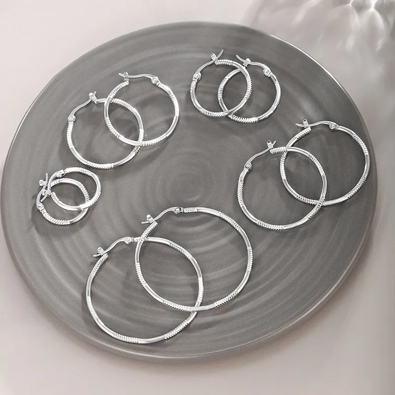Wholesale 1 Pair XUPING Simple Style Classic Style Solid Color 304 Stainless Steel Earrings