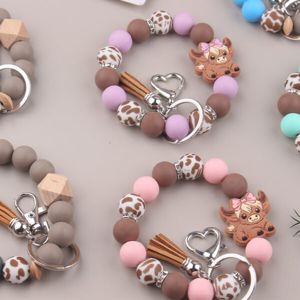 Wholesale New Cartoon Cow Consumption Silicone Bracelet Keychain Creative DIY Silicone Handmade Beaded Bracelet Women's Jewelry