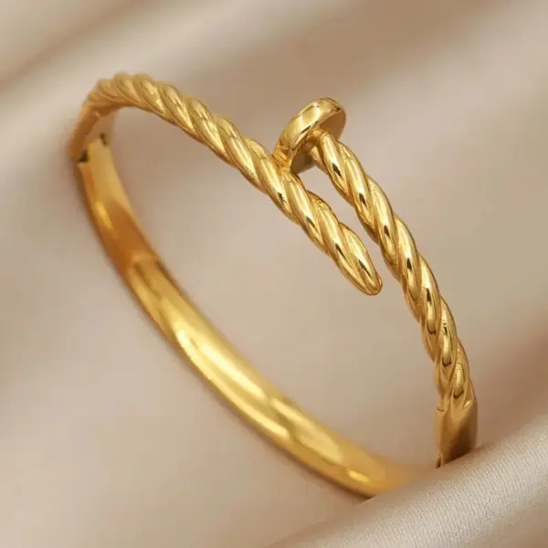 Wholesale 304 Stainless Steel Twist Ion Plating (IP) Real Gold Plated Simple Style Classic Style Waterproof Non Tarnish Asymmetrical Buckle Gold Bangle