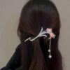 oly-c625bfddde02db2f50d259c0d086182c Wholesale Advanced Cat's Eye Stone Tulip Tassel Hairpin Women's Back of Head Twist Clip Frog Buckle Headess