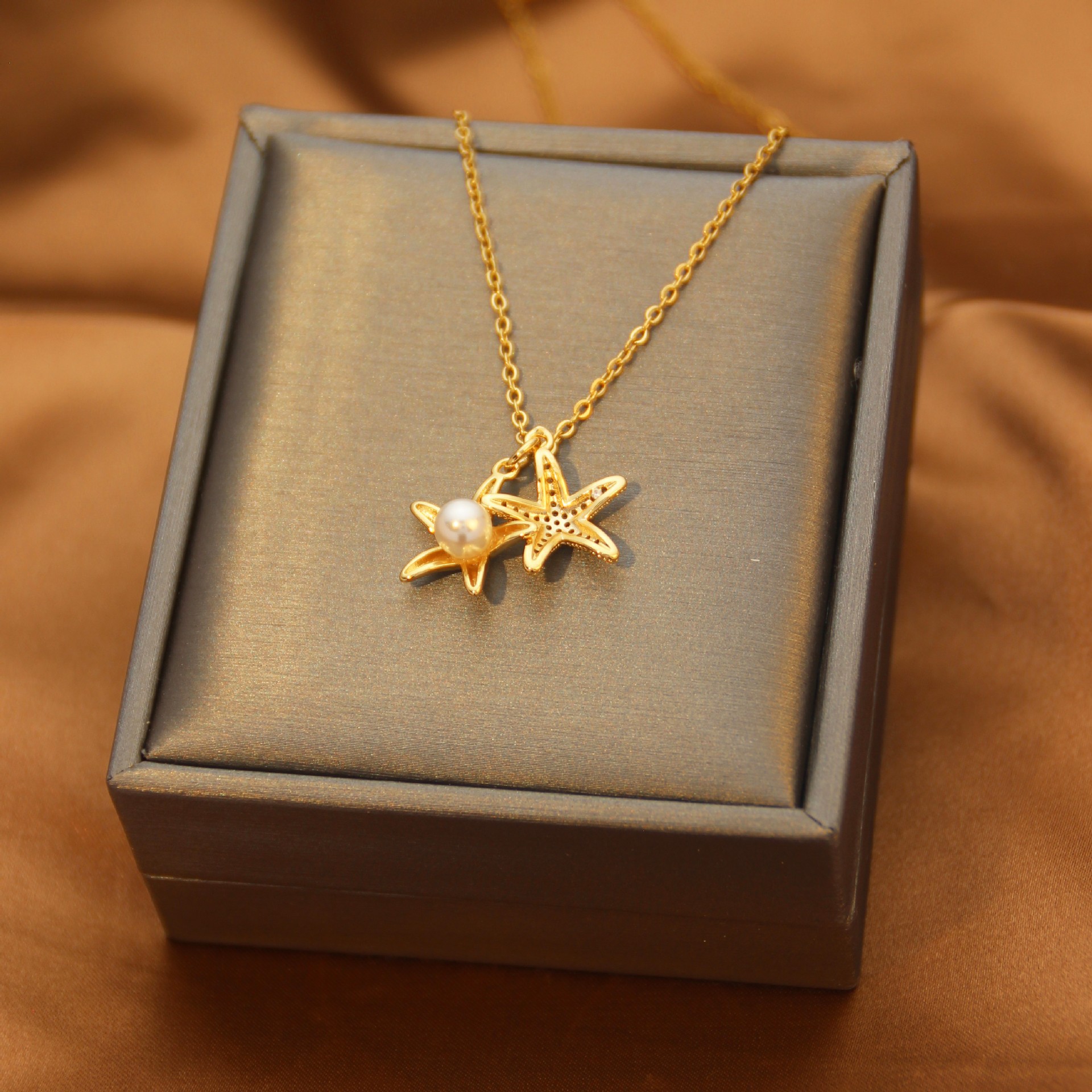 Wholesale Golden Starfish pearl necklace for women ins trendy niche design sense can be opened pendant with Diamond light luxury titanium steel neckla