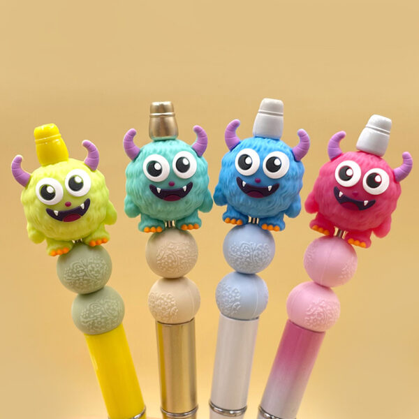 oly-c6ec021c22de99d0ce6084044b8b30c5 Wholesale Cross-Border New Food Grade 3D Silicone Monster Teether Beads Keychain Can Be Used as Pen Accessories Ready for Sale