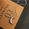 Wholesale Ig Style Moon Titanium Steel Polishing Pendant Necklace
