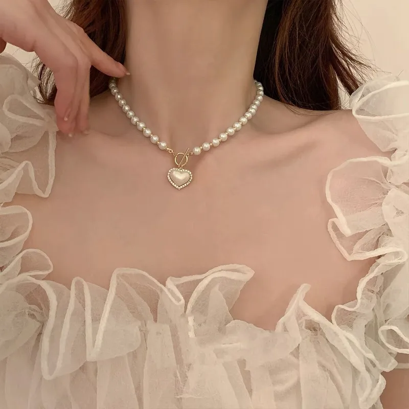 Wholesale Elegant Heart Shape Imitation Pearl Alloy Beaded Plating Inlay Rhinestones Pearl Women's Pendant Necklace