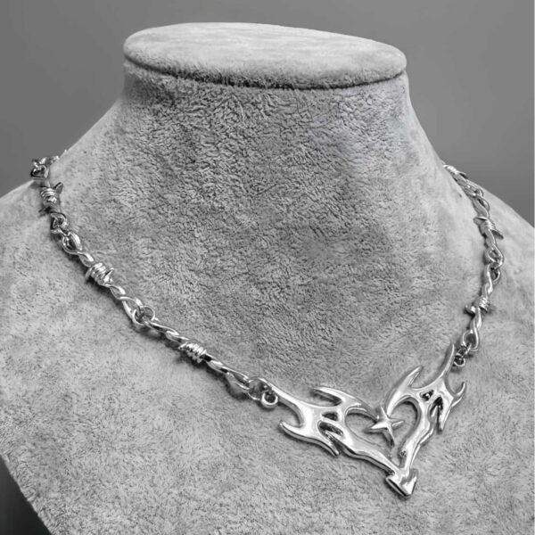 oly-c7961012ef773951a7d5ced6873a8a35 Wholesale European and American Hollow Flame Totem Heart Small Iron Thorn Necklace Pendant Ins Hip-Hop Stylish Clavicle Chain Accessories