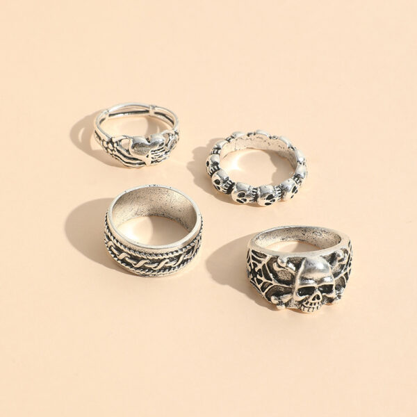 Wholesale European and American fashion jewelry men's punk exaggerated ring Gothic style imp skull heart ring 4-piece set