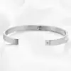 Wholesale Simple Style Solid Color Stainless Steel Inlay Zircon Bangle