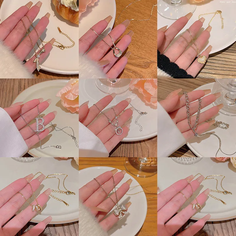 Wholesale Simple Style Heart Shape Bow Knot Titanium Steel Inlay Zircon Pendant Necklace