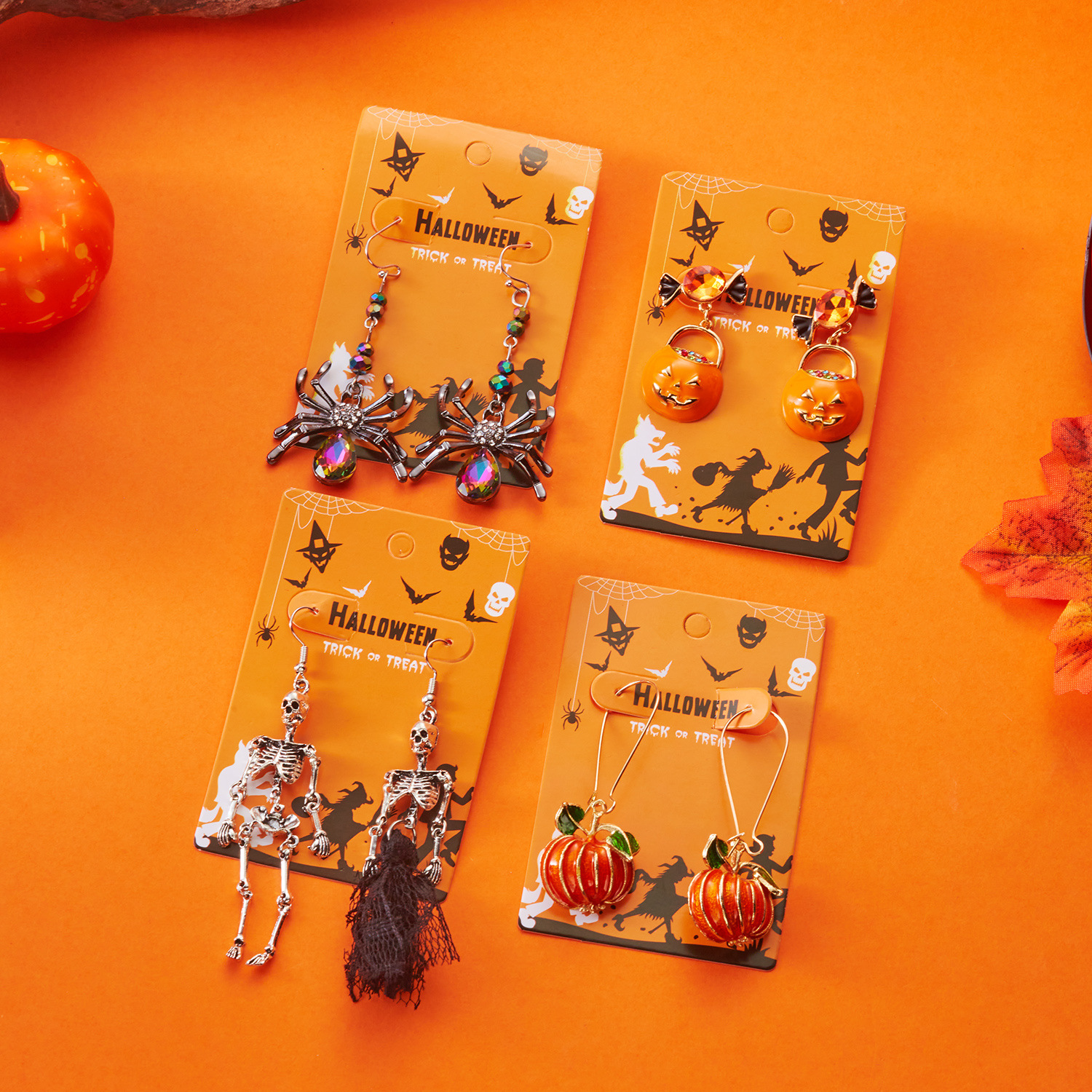Wholesale New European and American cross-border earrings for women, niche and versatile design, pumpkin head ghost skull earrings