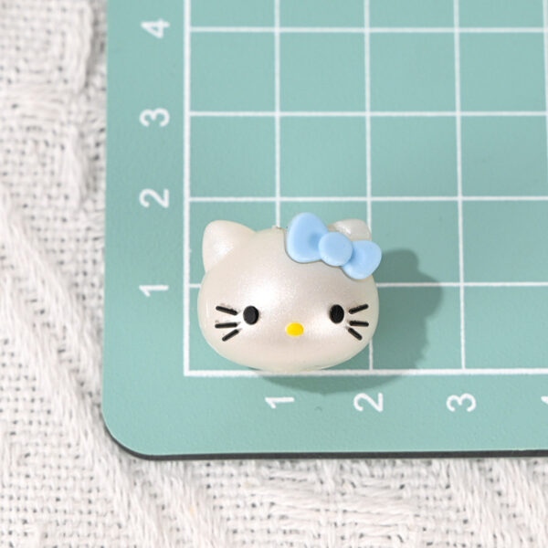 oly-c982c1e748381bea0eb04aab2380d934 Wholesale Cartoon rubber kt cat beaded cute pen accessories diy bag chain mobile phone chain key chain loose beads material