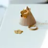 Wholesale 304 Stainless Steel Flower PVD Coated 18K Real Gold Plated 18K Gold Fashion Waterproof Non Tarnish Gold Plated Gold Drop Earrings