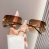 oly-c9d27cfe961fe863cb13523c5c75e24d Wholesale frameless sunglasses sunscreen glasses fashion high sense butterfly aessories diamond sunglasses ladies