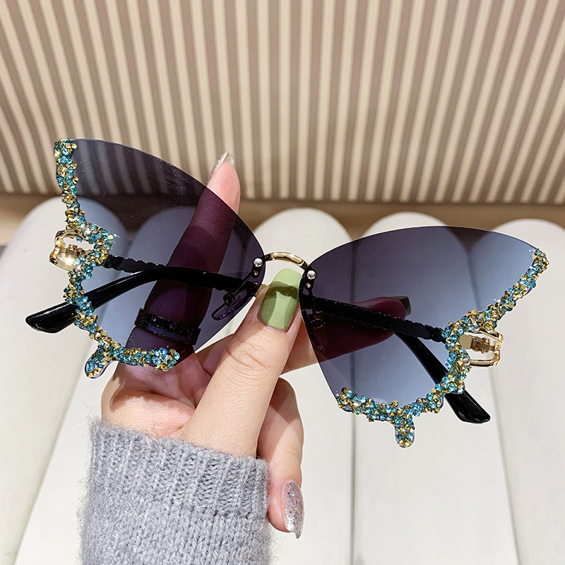 Wholesale Cross-border New Butterfly Shape Diamond Rimless Sunglasses Women's Fashion Personality Exaerated Sunglasses European and American Internet