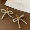Wholesale Lady Style Bow Pearl Earrings 2024 New Style Gentle Girl Ear Buckle French Retro Earrings High Earrings