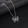 oly-cba6cff40a1e5e6993f7332a134fb603 Wholesale aessories small stainless steel hollow volleyball plant flowers butterfly pendant necklace jewelry men