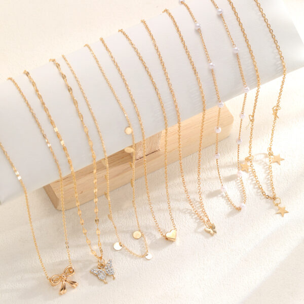 Wholesale New semi-managed cross-border European and American style fashion bow love pearl necklace 7-piece set niche design female