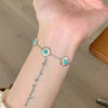 Wholesale "Floating Dream" Vintage Brushed Faux Turquoise Daisy Bracelet - Retro, Light Luxury, Niche, Flattering, and Elegant Jewelry