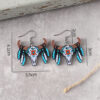 oly-cc72b10e7449f2e4fa1235f85853d47e Wholesale Western ethnic style bull head wooden double-sided earrings