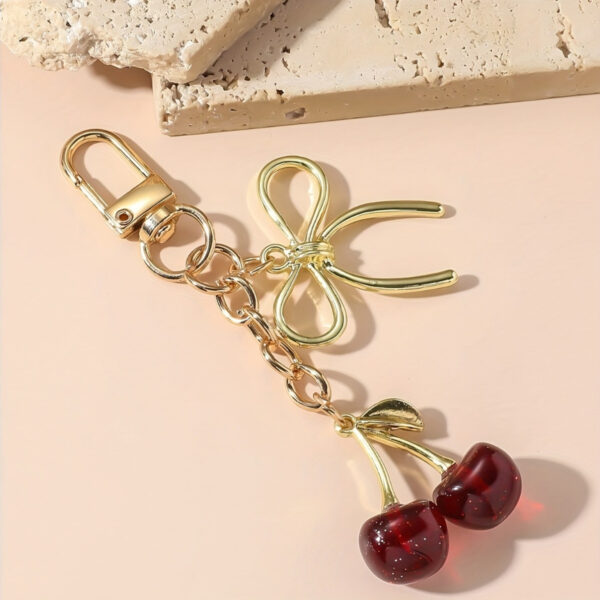 Wholesale European and American Jewelry Simulation Crystal Cherry Keychain Bag Hanging Bow Pendant Design Sense Fruit Key Chain
