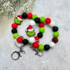 Wholesale Christmas Green Hair Monster Series Keychain OLY Exclusive