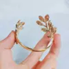 Wholesale 1 Piece Stainless Steel Exaggerated Geometric Open Bracelet Shell Five-Leaf Flower Bracelet Irregular Personality Starfish Shiny Bracelet Suitable For Women's Daily Wear