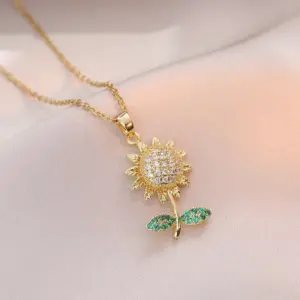 X1197 Gold Emerald Rotating Sunflower Necklace