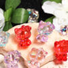 oly-cdbf4e8142b9489846dd7840a20f5c63 Wholesale High-transparent magic beaded stereo bow kitten vertical hole beads diy mobile phone chain keychain aessories