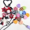 oly-cf4c20a461a24410224a40c8131e108f Wholesale Through-hole painted colored woven heart-shaped beads