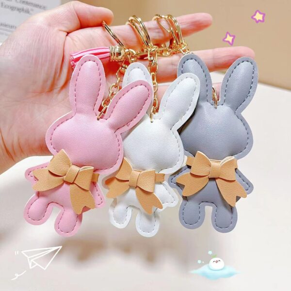 oly-d07e6c3987bf3a3d06ffd6af4168e44a Wholesale Foreign trade leather rabbit key chain cute girl heart bag pendant exquisite mobile phone shell patch gift