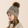 Wholesale Autumn/Winter Leopard Print Jacquard Pom-Pom Knitted Hat for Children
