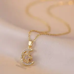 X2038 Star and Moon Rotating Necklace