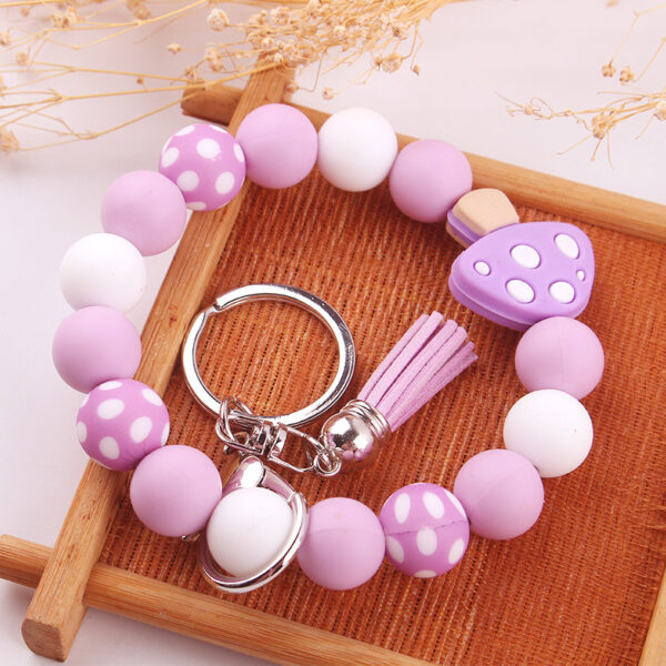 Wholesale New wrist keychain pendant leather PU short tassel mushroom silicone beaded bracelet key ring accessories