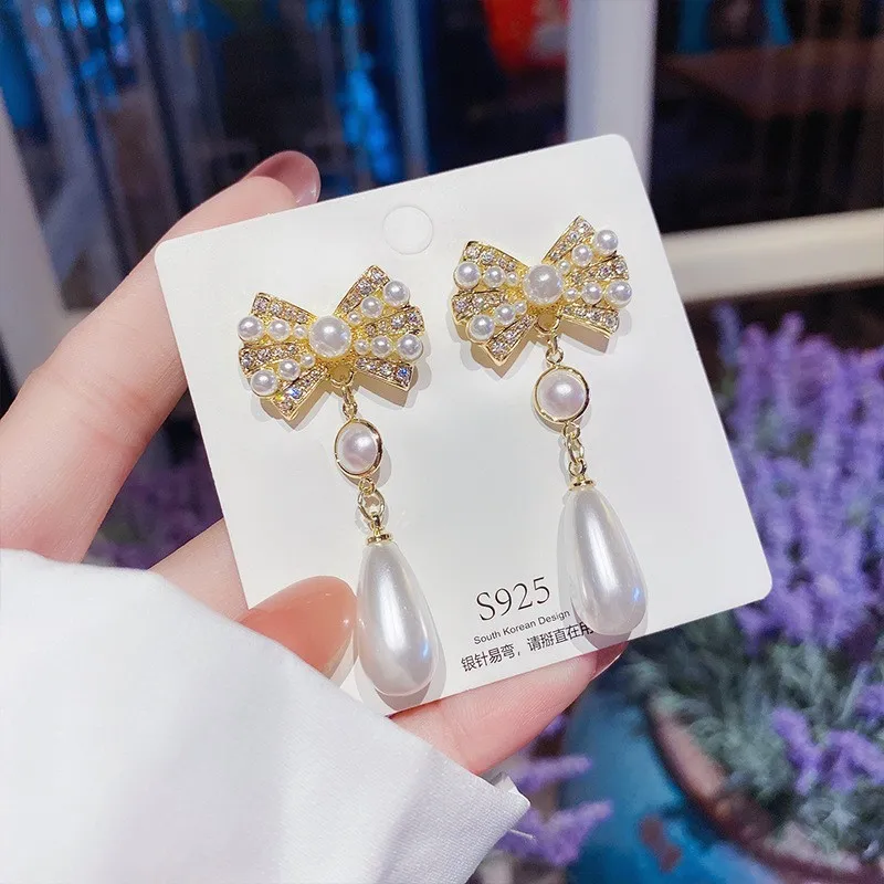 Wholesale Fashion Tassel Butterfly Bow Knot Copper Inlay Artificial Pearls Rhinestones Earrings 1 Pair