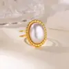 Wholesale Luxurious Vintage Large Imitation Pearl Women's Ring 18K Gold Plated Four-Leaf Clover Rotating Heart Blue Zircon Jewelry Ring