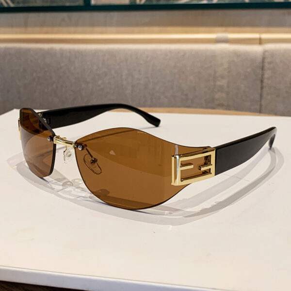 Wholesale Retro Frameless Oval Curved Sunglasses Y2K Metal Ins Sunglasses Women's Hot Girls Sunglasses Street Photography Future Style