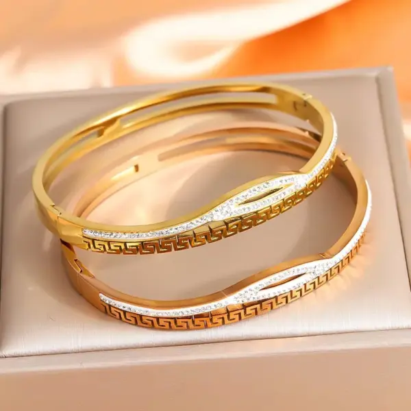 Wholesale Geometric Bangle For Women In Golden Titanium Steel With Electroplated Finish And Rhinestone Inlay