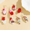 oly-d4028f65761cd57829c0ecfebc44e945 Wholesale Christmas handmade polymer clay red Santa Claus soft clay earrings