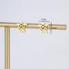 Wholesale 1 Pair Fashion Tortoise Letter Plating Hollow Out 201 Stainless Steel 18K Gold Plated Stainless Steel Earrings