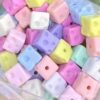 oly-d40dfd68b1f293b79ca5b8514a8b215e Wholesale Creamy solid colored cheese square straight hole bead