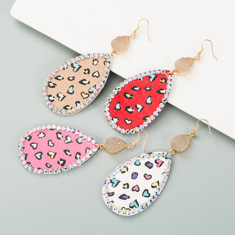 Wholesale European and American New Creative Design op-shaped leather printing inlaid small clear new stone earrings alloy inlaid rhinestone earrings