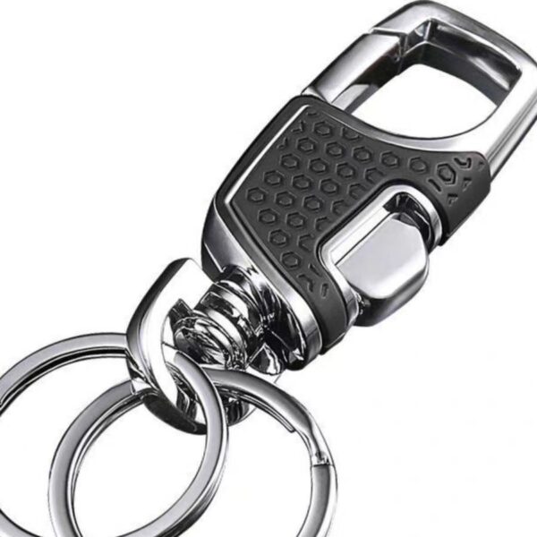 Wholesale High-end metal car keychain, one press, pioneering men's anti-lost waist hanging leather key ring key chain