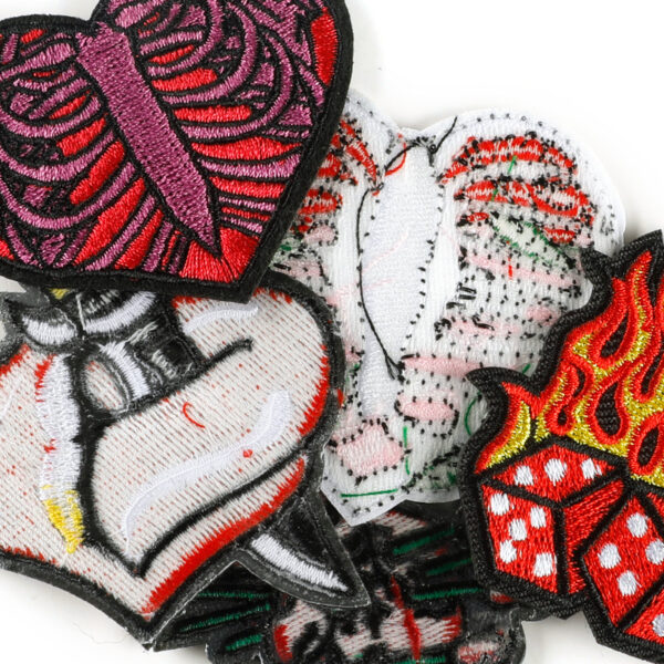 oly-d4c4d72e249060ed9410f673779963ab Wholesale Computer embroidery logo heart-shaped skull patch badge accessories cross-border e-commerce supply clothing accessories embroidery cloth stickers