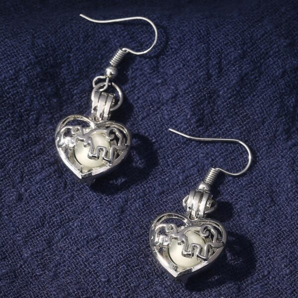 Wholesale Simple Fashion Mother's Day Animal Elephant Elephant Love Hollow Luminous Earrings Earrings European and American Jewelry