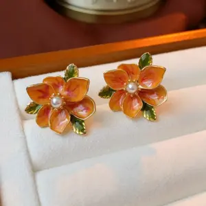 Silver Needle drop oil Pearl orange flower leaf earrings