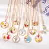 Wholesale Bohemian natural dried flower geometric polygon butterfly necklace epoxy pastoral style small floral pendant