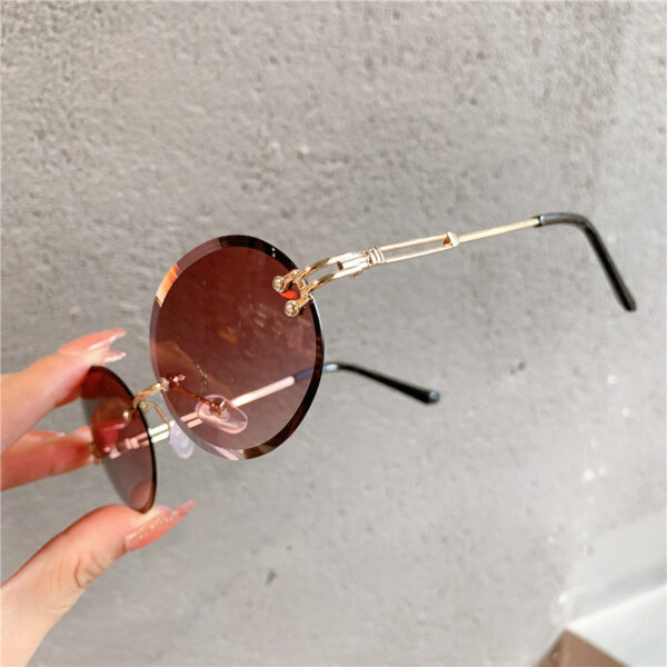 Wholesale Cross-Border New Style Sunglasses for Women, Oval Internet Celebrity Gradient Sunglasses, Rimless Cut-Edge Trendy Glasses