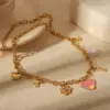 Wholesale Ion Plating (IP) 18K Gold Plated Devil's Eye Planet Red Heart 304 Stainless Steel Simple Style Commute Pendant Necklace
