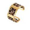 Wholesale Wide Open Stainless Steel Bracelet Plated In 18K Gold With Stylish Leopard Print Ribbon Fashionable Jewelry Accessory For Women